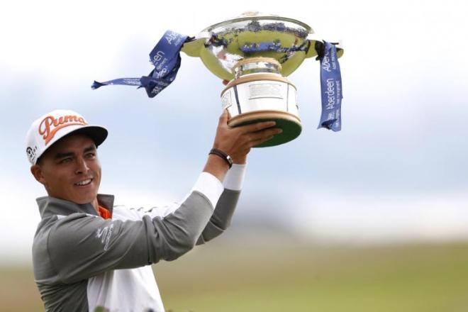 Rickie Fowler holding aloft his Scottish Open trophy. PHOTO: REUTERS