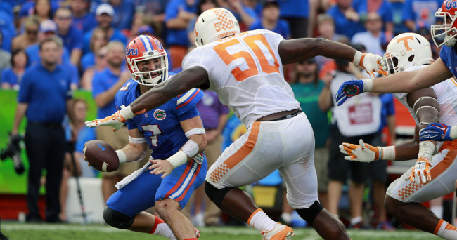 Sep 26, 2015; Gainesville, FL, USA; Florida Gators quarterback Will Grier (7) drops back as Tennessee Volunteers defensive lineman Corey Vereen (50) defends during the second half at Ben Hill Griffin Stadium. Florida Gators defeated the Tennessee Volunteers 28-27. Mandatory Credit: Kim Klement-USA TODAY Sports